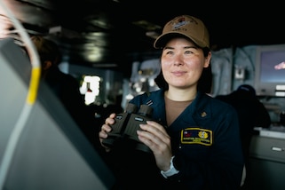 ATLANTIC OCEAN (May 10, 2024) Lt. Kristen Rosenthal, from Fresno, California, assigned to legal department as the disciplinary officer, stands junior officer of the watch on the bridge of Nimitz-class aircraft carrier USS George Washington (CVN 73) in the Atlantic Ocean, May 10, 2024.