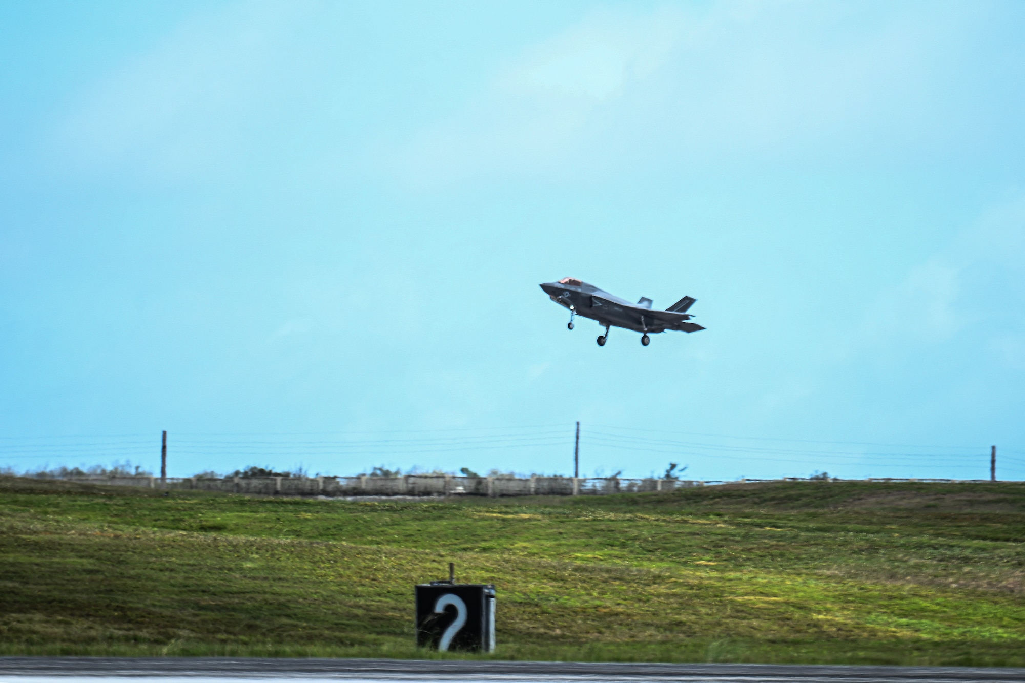A U.S. Marine Corps F-35B Lightning II prepare to land on the flightline.