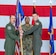 U.S Air Force Col. Bret Echard, 86th Operations Group commander, passes the 76th Airlift Squadron guidon to Lt. Col. Bryan Gibbs, incoming 76th AS commander, during the 76th AS change of command ceremony at Ramstein Air Base, Germany, May 10, 2024. The 76th AS operates in support of executive airlift and aeromedical evacuation missions across Europe, Africa and the Middle East areas of responsibility.  (U.S. Air Force photo by Airman 1st Class Olivia Sampson)