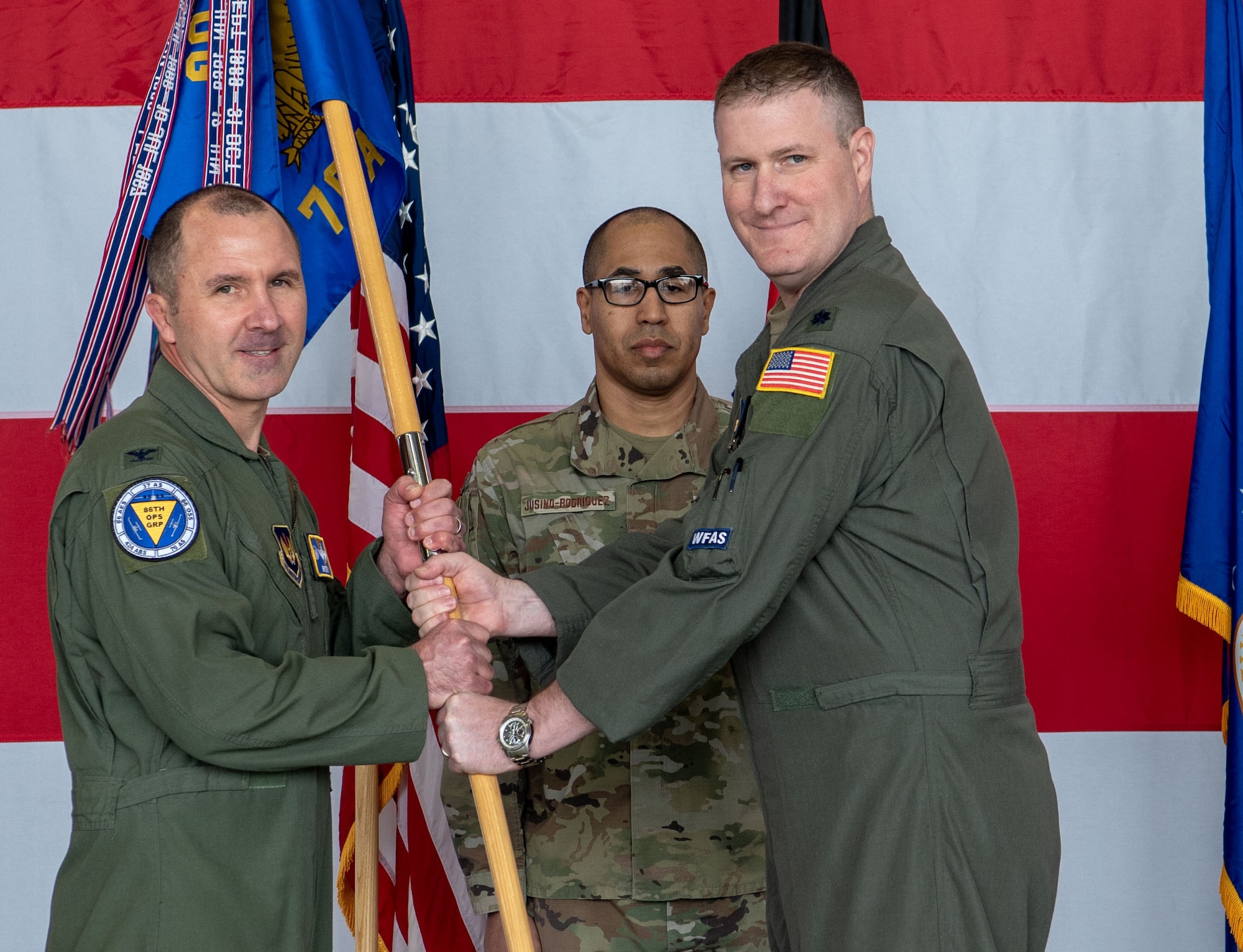 Man holds guidon