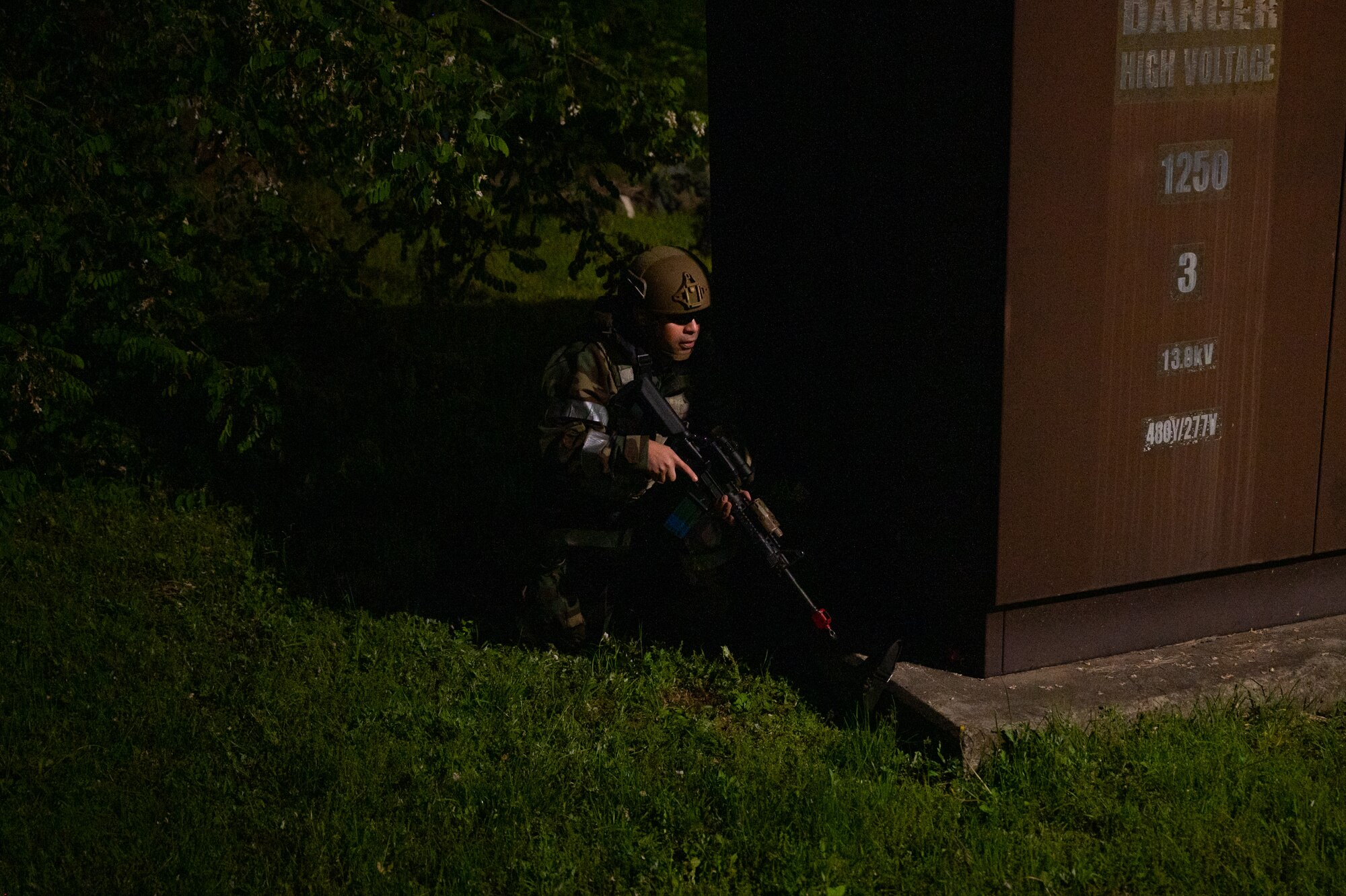 A U.S. Air Force Airman assigned to the 51st Security Forces Squadron responds to a simulated ground attack during Beverly Herd 24-1 at Osan Air Base, Republic of Korea, May 14, 2024. The Airmen of the 51st Fighter Wing continuously train to maintain the high level of full-spectrum readiness required to execute the mission proficiently and effectively. Routine training events like Beverly Herd are pivotal platforms for 51st Fighter Wing Airmen to refine their warfighting  proficiencies through practical application, concurrently enhancing their ability to respond skillfully to contingencies. (U.S. Air Force photo by Senior Airman Brittany Russell)