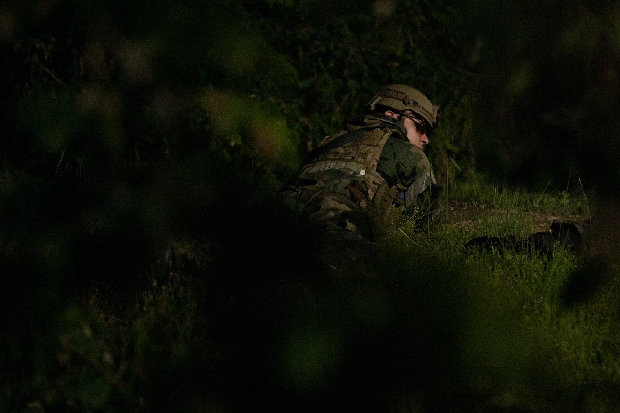 A U.S. Air Force Airman assigned to the 51st Security Forces Squadron responds to a simulated ground attack during Beverly Herd 24-1 at Osan Air Base, Republic of Korea, May 14, 2024. The Airmen of the 51st Fighter Wing continuously train to maintain the high level of full-spectrum readiness required to execute the mission proficiently and effectively. Routine training events like Beverly Herd are pivotal platforms for 51st Fighter Wing Airmen to refine their warfighting  proficiencies through practical application, concurrently enhancing their ability to respond skillfully to contingencies. (U.S. Air Force photo by Senior Airman Brittany Russell)