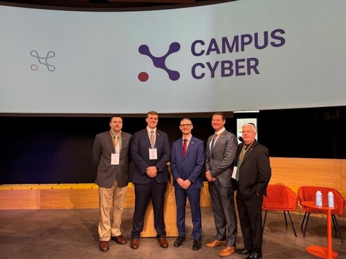 A team of Air Command and Staff College students stand for a group photo at the 2024 International Cyber 9/12 Strategy Challenge