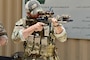 A Green Beret with 5th Special Forces Group (Airborne) sights in his M-4 carbine rifle during Eager Lion 24 at King Abdullah II Operations Training Center near Amman, Jordan, May 11, 2024. Eager Lion 24 is a multilateral exercise, with 33 participating nations, hosted by the Hashemite Kingdom of Jordan, designed to exchange military expertise, and improve interoperability among partner nations, and considered the capstone of a broader U.S. military relationship with the Jordanian Armed Forces. Jordan is one of U.S. Central Command’s strongest and most reliable partners in the Levant sub-region. (Photo has been altered for security purposes.