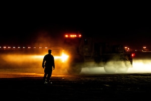 A U.S. Marine assigned to 2nd Marine Logistics Group watches a convoy arrive at an undisclosed location within the U.S. Central Command area of responsibility during Native Fury 24, May 10, 2024. NF 24 enhances interoperability with our partners while strengthening our ability to plan and execute operations across multiple domains. (U.S. Air Force photo by Airman 1st Class Alondra Cristobal Hernandez)