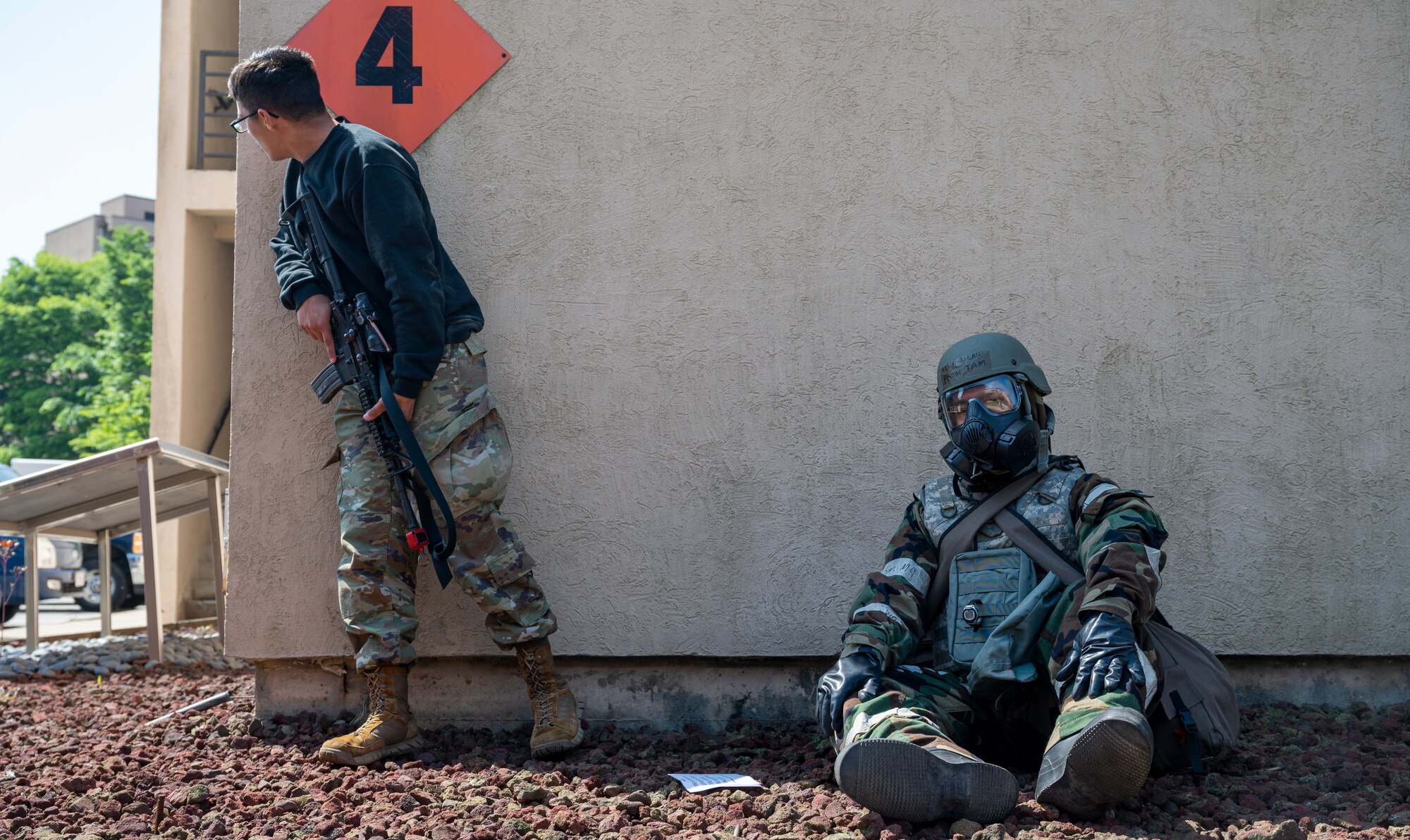 U.S. Air Force Airmen assigned to the 51st Fighter Wing conduct a simulated attack scenario during Beverly Herd 24-1 at Osan Air Base, Republic of Korea, May 14, 2024. During BH 24-1, the 51st Communications Squadron simulated an active attack on their facility, where Airmen had to ensure protection of personnel and assets. Routine training events like Beverly Herd are pivotal platforms for 51st Fighter Wing Airmen to refine their warfighting proficiencies through practical application, concurrently enhancing their ability to respond skillfully to contingencies. (U.S. Air Force photo by Senior Airman Sabrina Fuller-Judd)