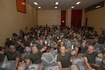 U.S. Marine Corps recruits with Hotel Company, 2nd Recruit Training Battalion, conduct a gear check during a receiving event at Marine Corps Recruit Depot San Diego, May 6, 2024. During the receiving process recruits are checked for contraband, given haircuts, allowed a phone call home, and are issued their gear required for training. (U.S. Marine Corps photo by Lance Cpl. Janell B. Alvarez)