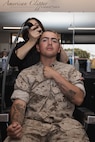 U.S. Marine Corps Recruit Joshua Gonzalez with Bravo Company, 1st Recruit Training Battalion, receives a weekly haircut during a post exchange and haircut call at Marine Corps Recruit Depot San Diego, California, May 8, 2024. Recruits are allowed to go to the PX to purchase necessary supplies and receive haircuts weekly during their time at MCRD San Diego in order to maintain a uniform appearance and promote good hygiene throughout recruit training. (U.S. Marine Corps photo by Lance Cpl. Janell B. Alvarez)
