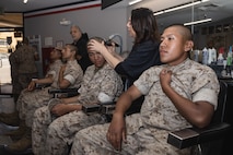 U.S. Marine Corps recruits with Bravo Company, 1st Recruit Training Battalion, receive a weekly haircut during a post exchange and haircut call at Marine Corps Recruit Depot San Diego, California, May 8, 2024. Recruits are allowed to go to the PX to purchase necessary supplies and receive haircuts weekly during their time at MCRD San Diego in order to maintain a uniform appearance and promote good hygiene throughout recruit training. (U.S. Marine Corps photo by Lance Cpl. Janell B. Alvarez)