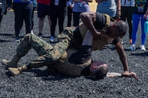 U.S. Marines with Support Battalion, Recruit Training Regiment, demonstrate techniques from the Marine Corps Martial Arts Program to educators from Recruiting Stations Dallas, Fort Worth, Phoenix and San Antonio as part of the 2024 Educators Workshop at Marine Corps Recruit Depot San Diego, California, May 7, 2024. Participants of the workshop visited MCRD San Diego to observe recruit training and gain a better understanding about the transformation process recruits undergo to become United States Marines. Educators also received classes and briefs on the benefits that are provided to service members in the United States armed forces. (U.S. Marine Corps photo by Lance Cpl. Jacob B. Hutchinson)
