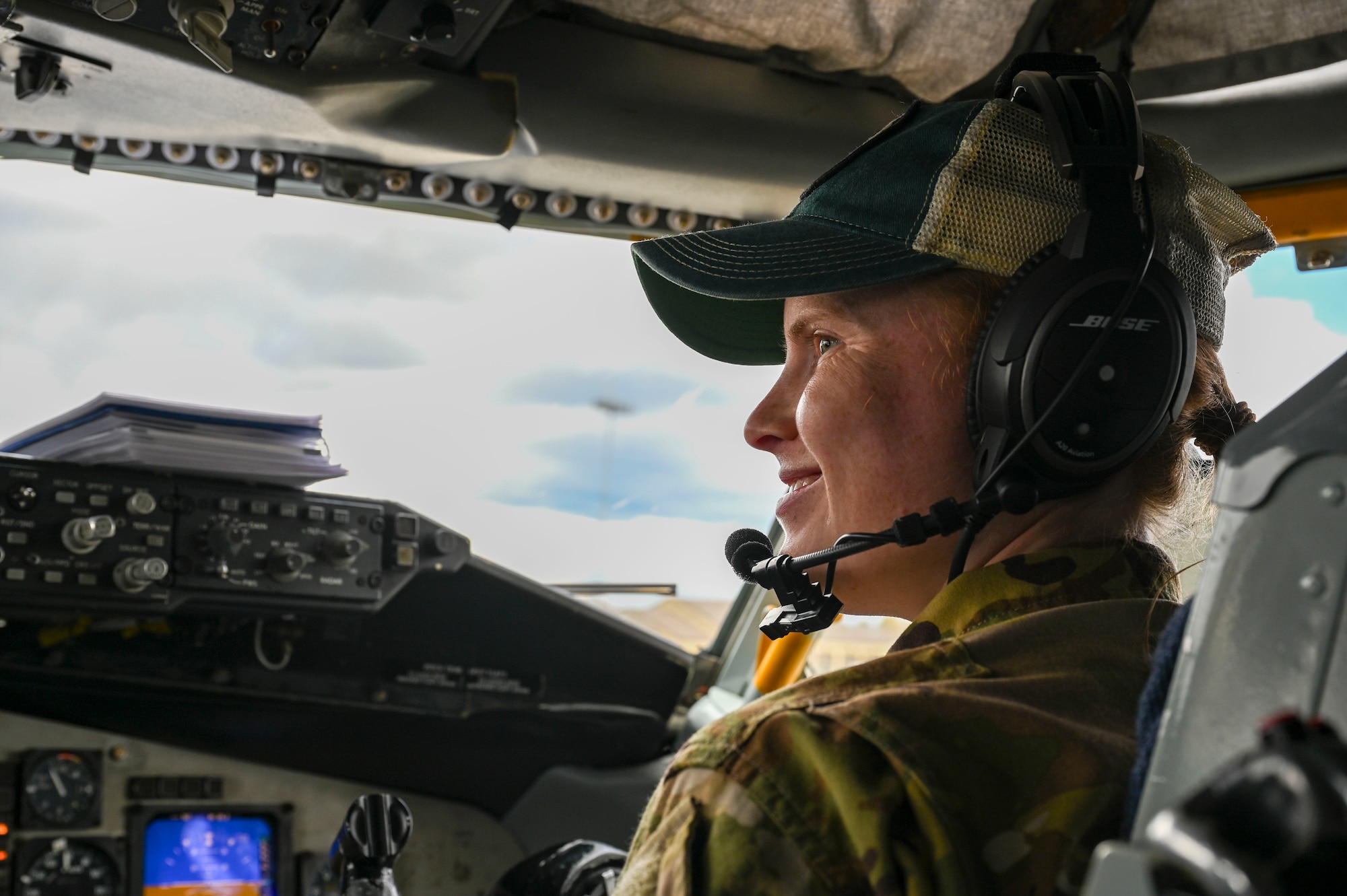 A pilot sits in a KC-135 Stratotanker.