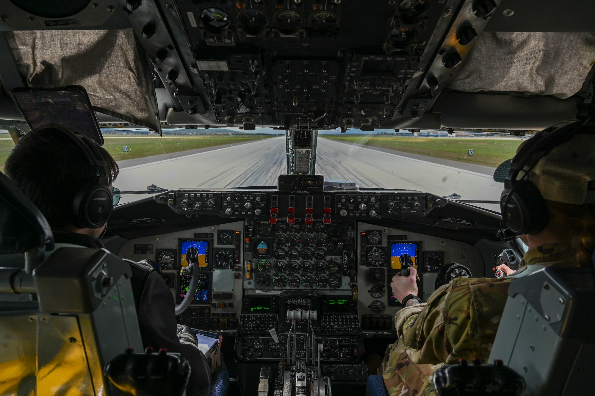 Pilots in a KC-135 Stratotanker takeoff.