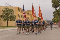 The U.S. Marine Corps staff of 3rd Recruit Training Battalion and Recruit Training Regiment participate in a motivational run at Marine Corps Recruit Depot San Diego, California, May 9, 2024. The motivational run is the final training event new Marines complete before graduating which consists of a three-mile run throughout the Depot. (U.S. Marine Corps photo by Lance Cpl. Alexandra M. Earl)