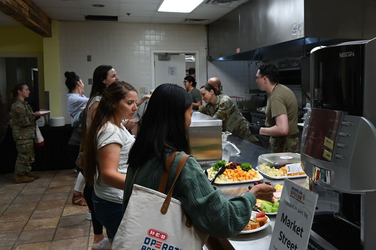 Goodfellow Air Force Base first sergeants serve lunch to spouses at the Powell Event Center, Goodfellow Air Force Base, Texas, May 10, 2024. Lunch was provided towards the latter half of the Military Spouse Resiliency & Wellness Day before the event started to wrap up. (U.S. Air Force photo by Airman 1st Class Brian Lummus)