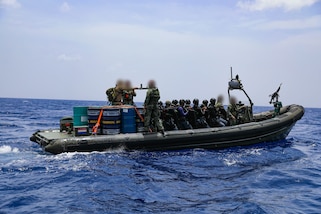 Service members from the Netherlands and the Dominican Republic prepare to conduct a live fire exercise off the coast of Barbados Coast Guard Base Station Pelican, Barbados, during TRADEWINDS 24 (TW24) on May 7, 2024.