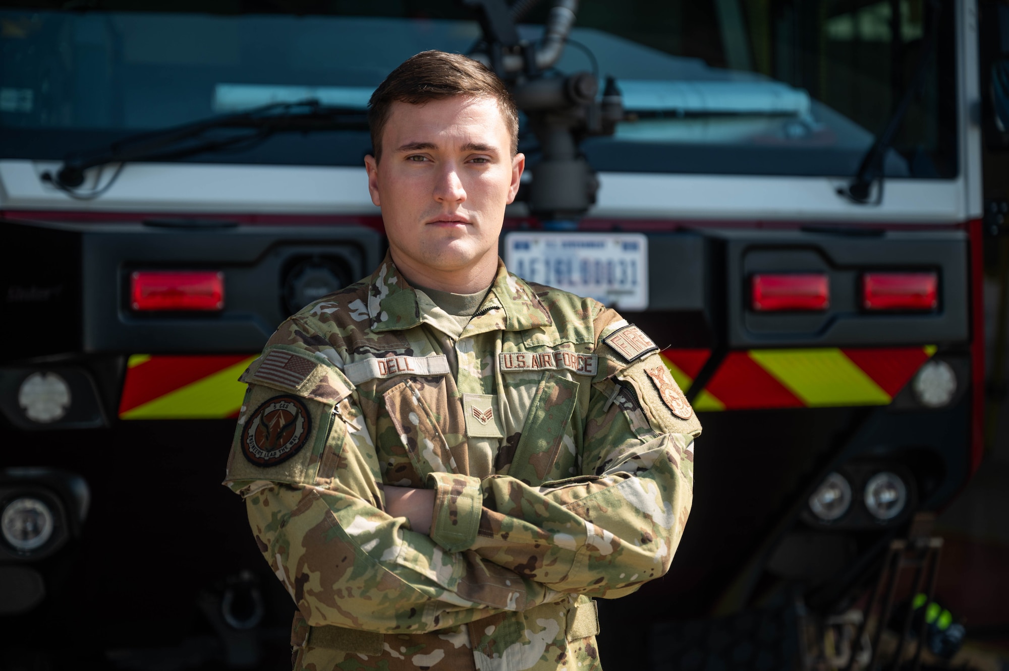 Senior Airman Charles Dell, 5th Civil Engineering Squadron logistics manager, poses for a photo at Minot Air Force Base, North Dakota, May 14, 2024. Dell is the first enlisted person to ever be selected for the Naval Postgraduate School's Homeland Defense and Security Emergence Program. (U.S. Air Force photo by Airman 1st Class Luis Gomez)