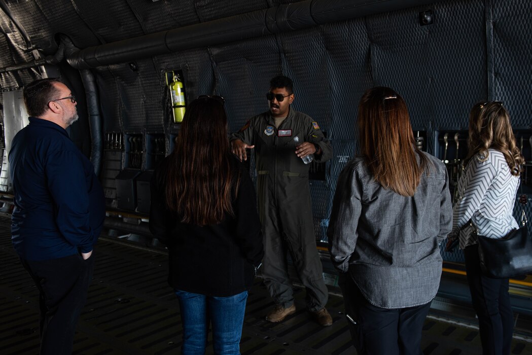 Airmen gives a tour of C-5M aircraft.