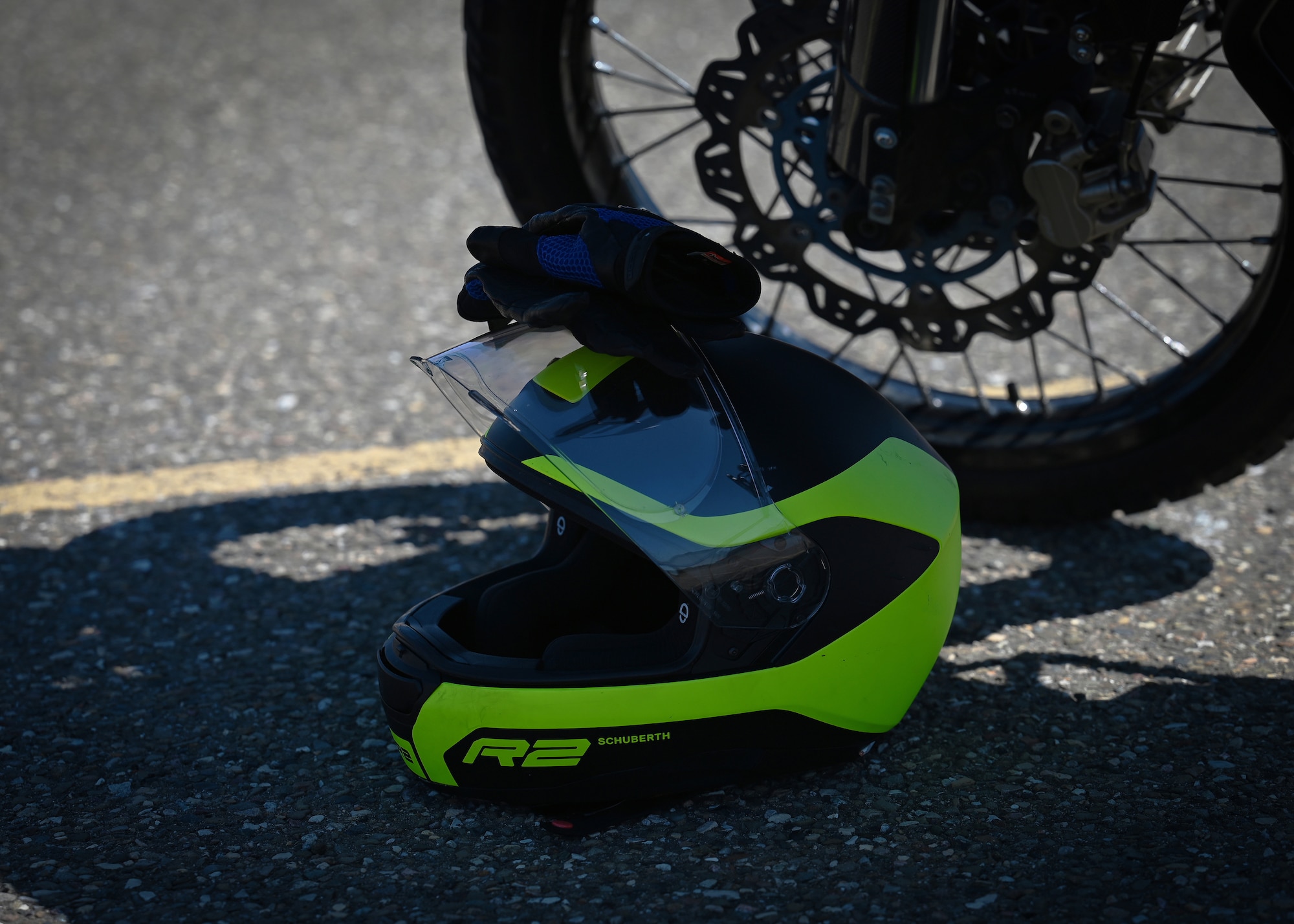 A person rides a motorcycle.