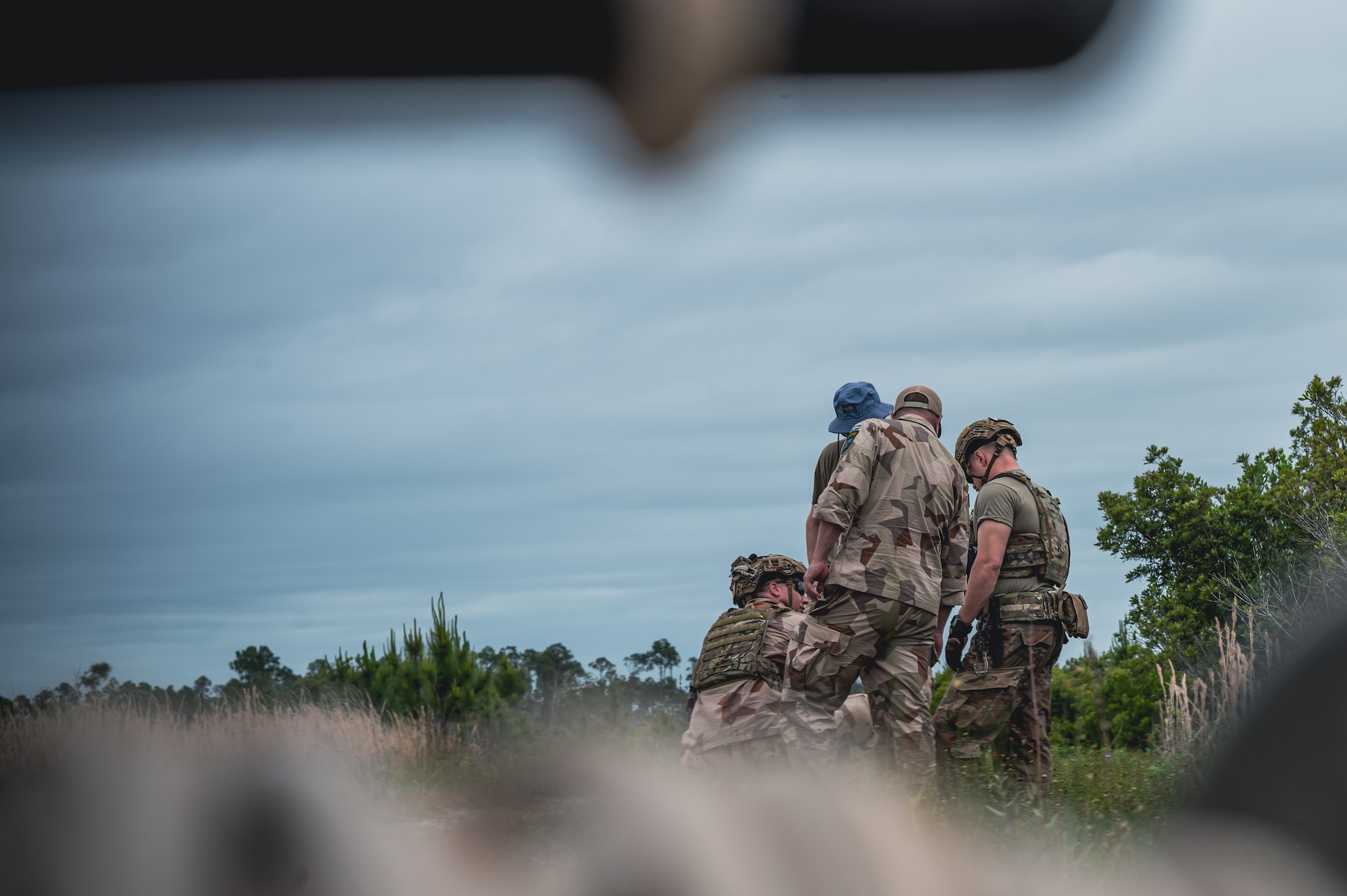 military members work together