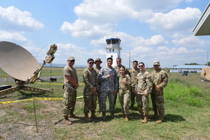 Photo of U.S. Air Force Airmen speaking with a Philippine Air Force officer