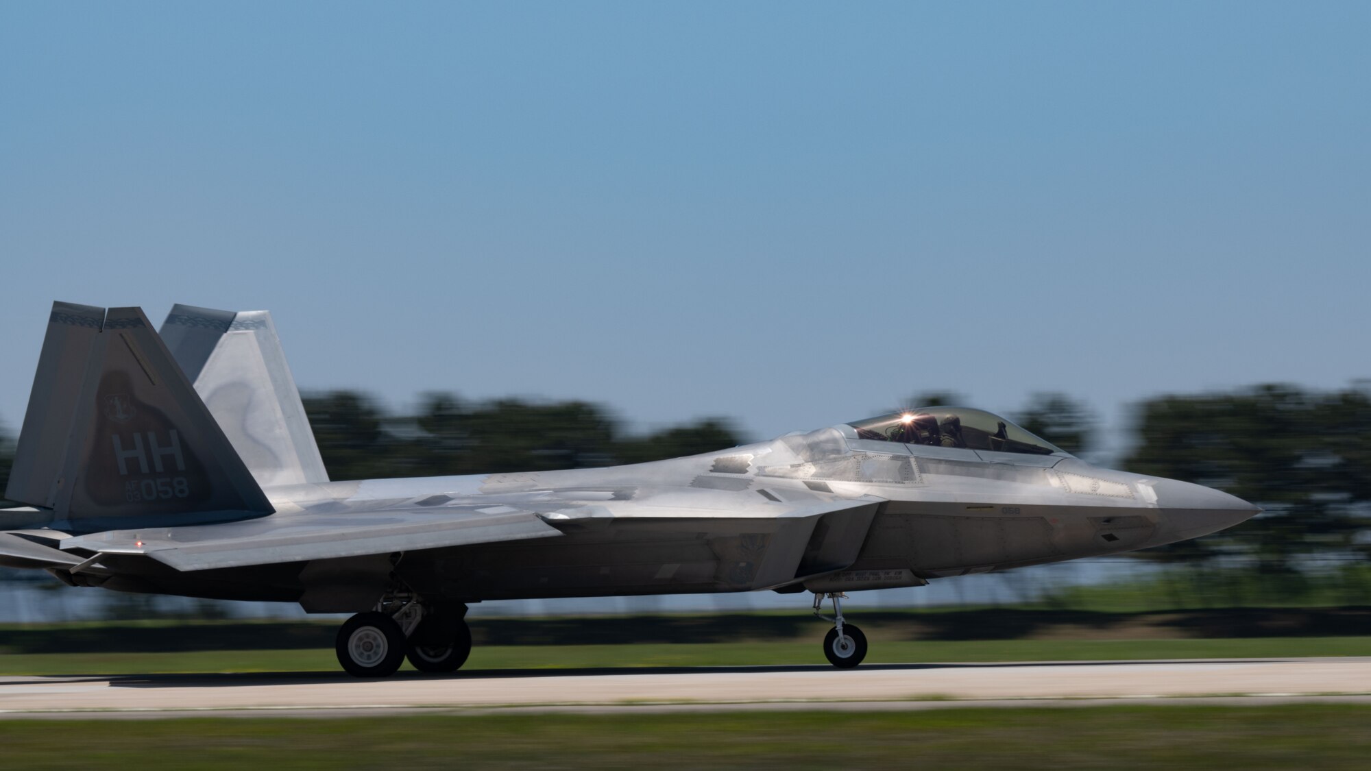 An F-22 Raptor aircraft lands at Kunsan Air Base.