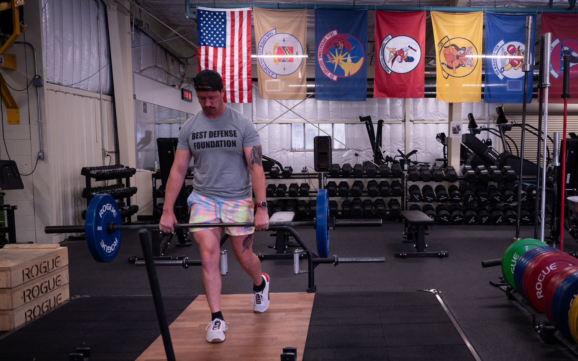Maj. Kenneth Durben, 63rd Fighter Squadron F-35 Lightning II instructor pilot, lifts a barbell at the 56th Fighter Wing Tactical Integrated Training and Nutrition (TITAN) Arena, April 18, 2024, at Luke Air Force base, Arizona.
