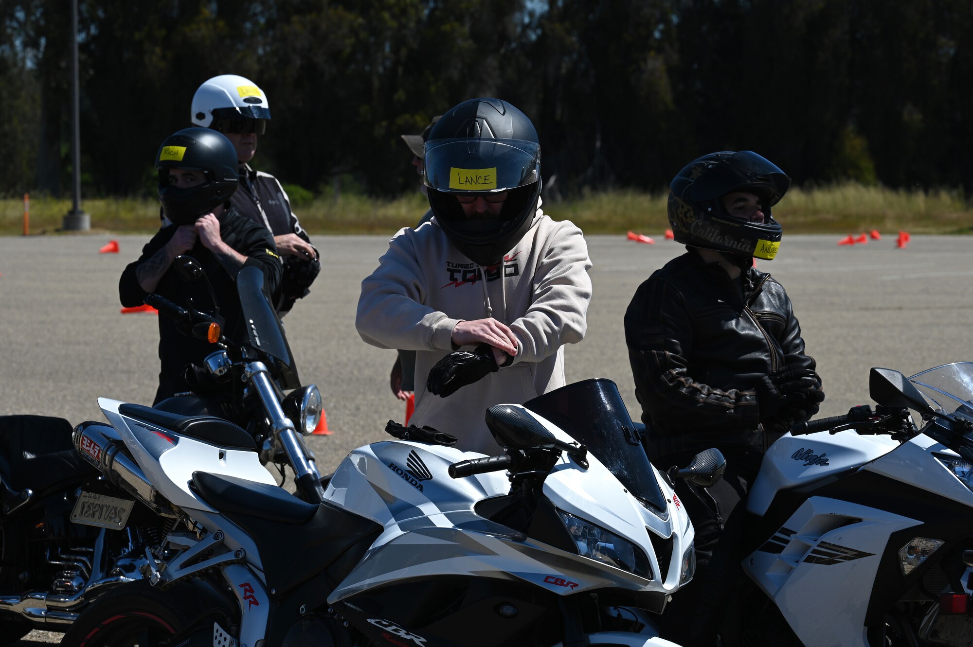 A person rides a motorcycle.