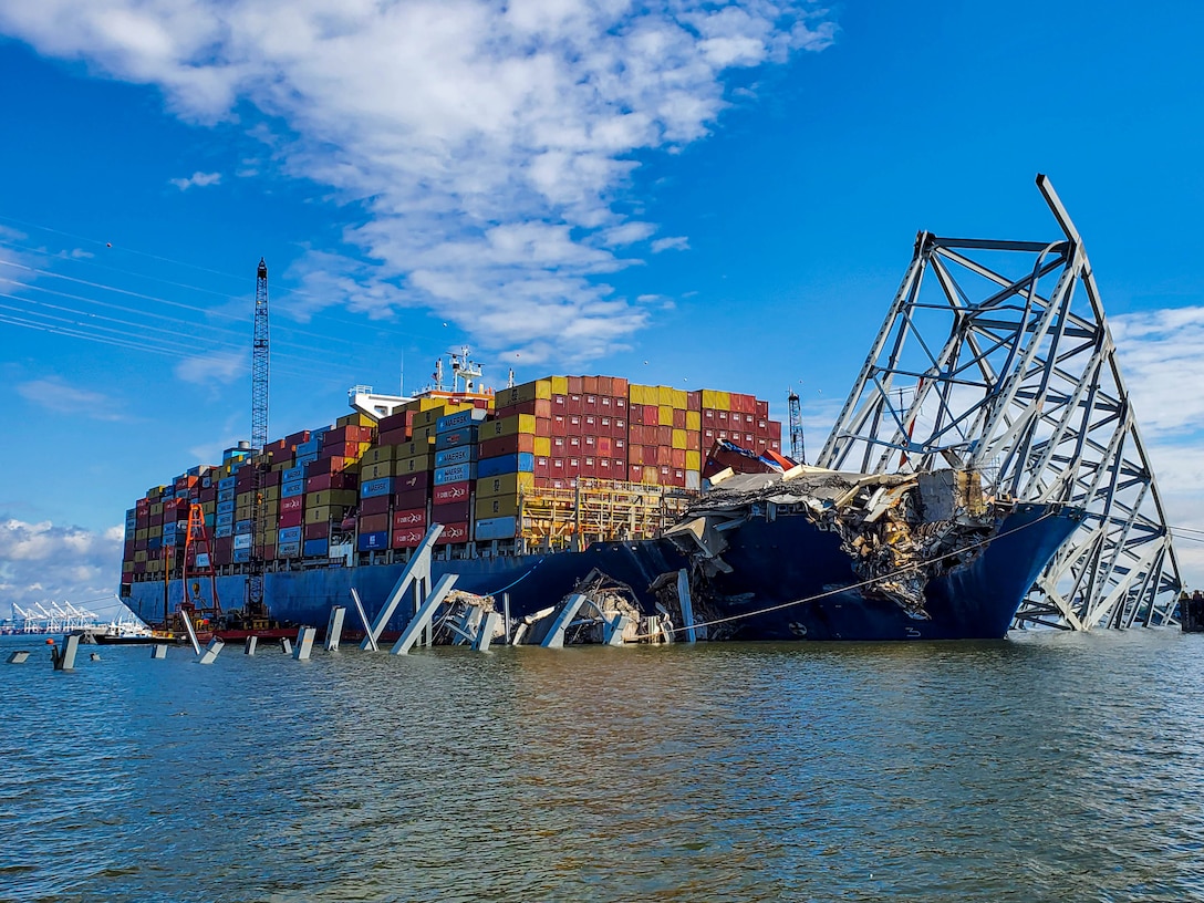 Wreckage of the Francis Scott Key Bridge encases the cargo ship M/V Dali.