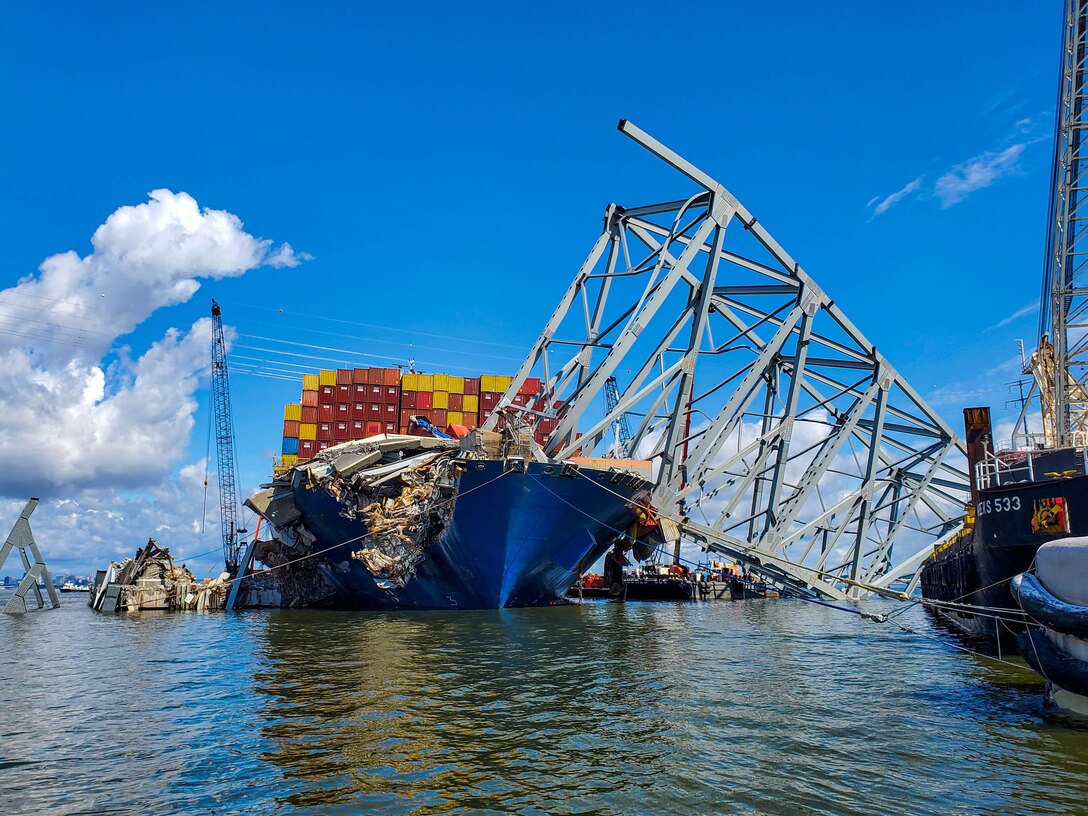 Wreckage of the Francis Scott Key Bridge encases the cargo ship M/V Dali.