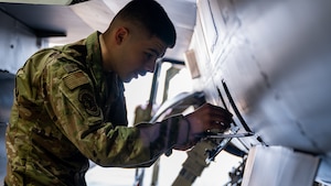 A1C Andrew Petefish, 35th FGS dedicated crew chief, provides preventative maintenance on a F-16 Fighting Falcon.
