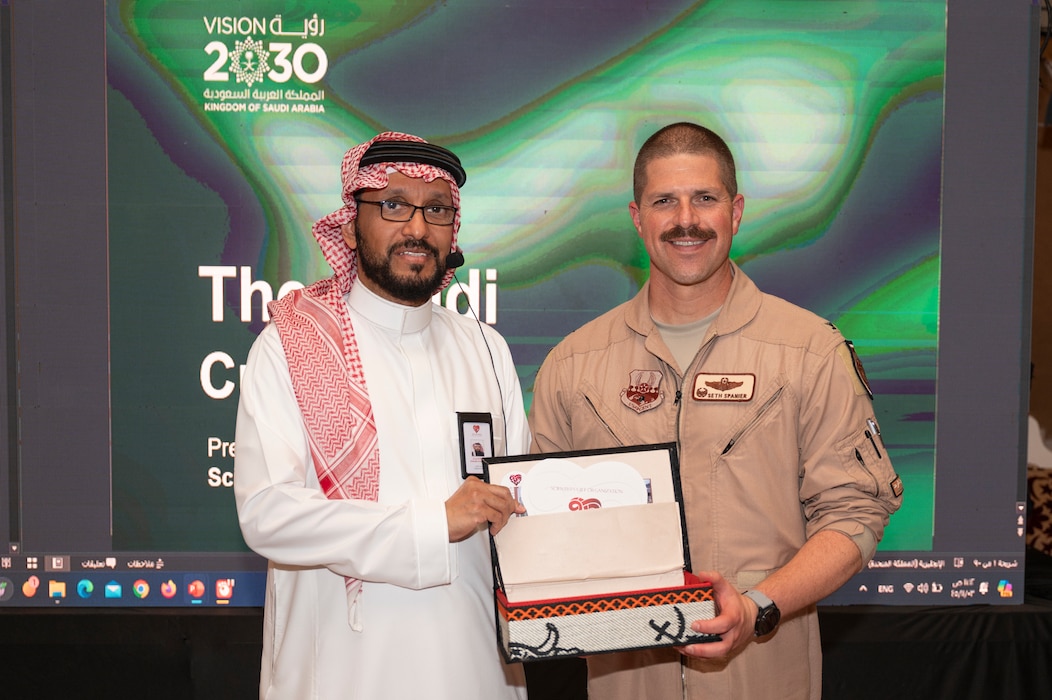 U.S. Air Force Col. Seth Spanier, 378th Air Expeditionary Wing commander, accepts a gift during a Saudi Arabian Culture Day at an undisclosed location within the U.S. Central Command area of responsibility, May 11, 2024. Culture day was a collaborative effort between the Scientist's Gift Program, local members of the Royal Saudi Air Force and the 378th AEW Host Nation Coordination Cell to provide an opportunity to learn about the history, culture and traditions of Saudi Arabia. (U.S. Air Force photo)