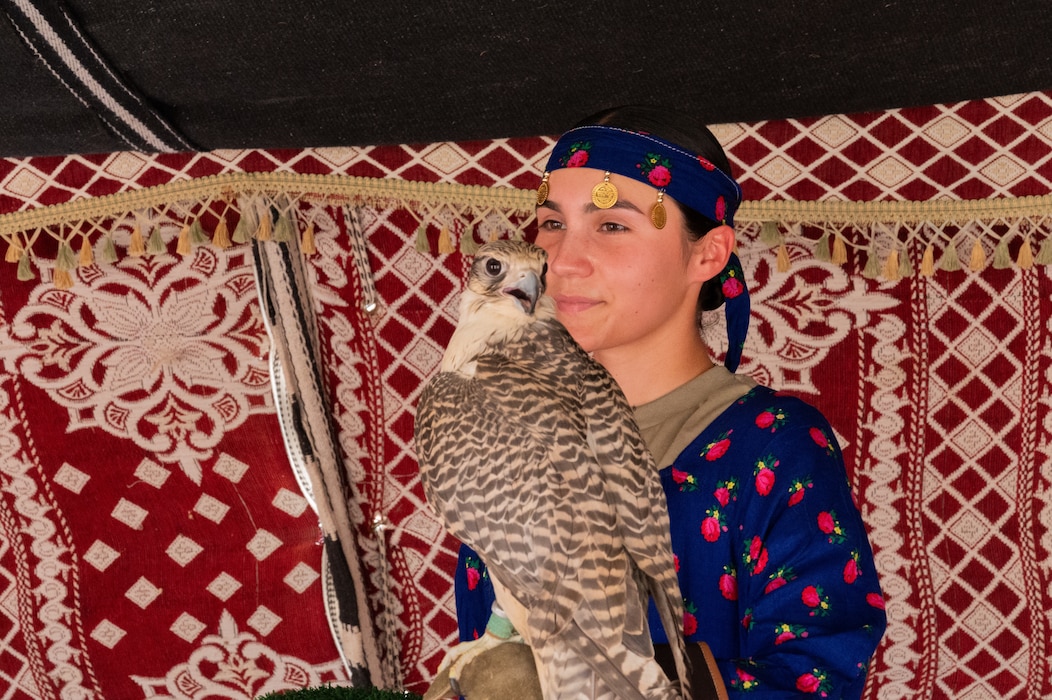 A U.S. Army Soldier holds a falcon during a Saudi Arabian Culture Day at an undisclosed location within the U.S. Central Command area of responsibility, May 13, 2024. Culture Day provided valuable professional exchanges between Saudi citizens and U.S. Department of Defense service members. (U.S. Air Force photo)