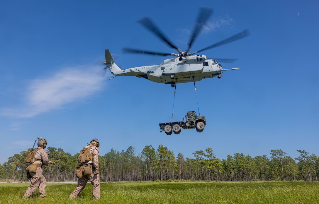 U.S. Marines with 2d Battalion, 10th Marine Regiment, 2d Marine Division conduct a tactical movement during a Fire Exercise (FIREX) on Camp Lejeune, North Carolina, April 26, 2024. The FIREX is a regiment level exercise designed to increase mission capabilities and enhance operational readiness. (U.S. Marine Corps photo by Lance Cpl. Allegra Catalan-Dyson)