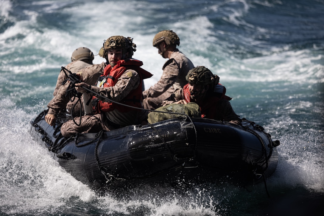 U.S. Marines with Maritime Special Purpose Force, 24th Marine Expeditionary Unit (MEU), conduct combat rubber raiding craft operations aboard the San Antonio-class amphibious transport dock ship USS New York (LPD 21), during Composite Unit Training Exercise (COMPTUEX), while underway in the Atlantic Ocean, May 7, 2024. The Wasp (WSP) Amphibious Ready Group (ARG) – 24th MEU is conducting COMPTUEX, their final at-sea certification exercise under the evaluation of Carrier Strike Group 4 and Expeditionary Operations Group. Throughout COMPTUEX, the WSP ARG-24th MEU is evaluated across a spectrum of scenarios that determine their readiness to deploy. (U.S. Marine Corps photo by Lance Cpl. Ryan Ramsammy)