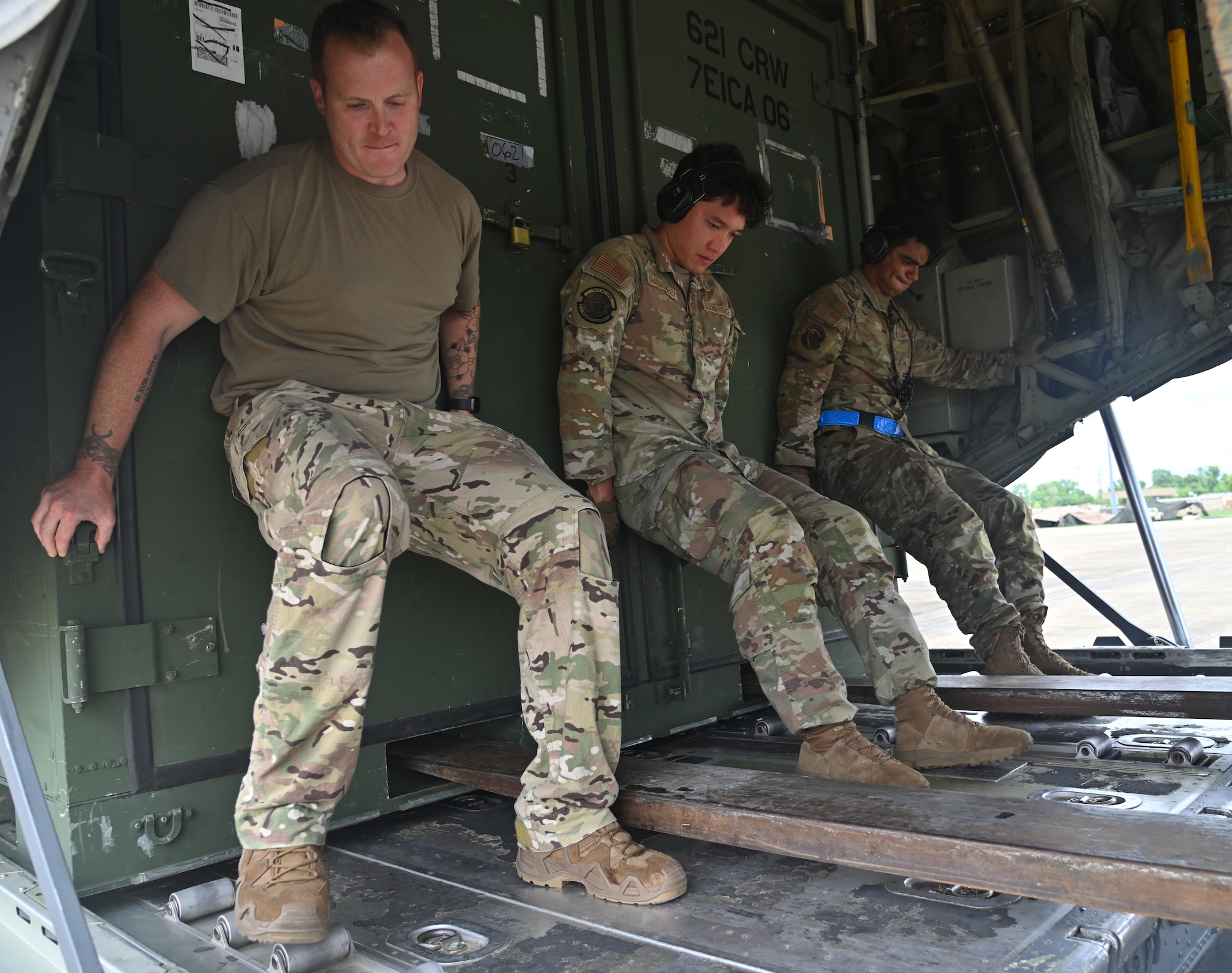 Airman from the 621st Contingency Response Squadron load cargo during Exercise Storm Flag in Alexandria, Louisiana, May 5, 2024.