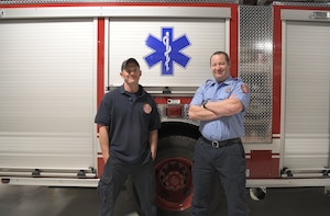 Westover firefighters Kevin Pearson is on the left and Capt. Brandon Requa is on the right and they are standing in front of a a firetruck on Sunday, May 5, 2024.