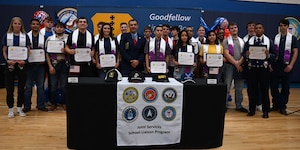 U.S. Army Master Sgt. (Ret) Leroy Petry, Medal of Honor recipient, poses for a group photo with the 23 recruits from the San Angelo Independent School District during the second annual Goodfellow Air Force Base Armed Forces Commitment Celebration at the Mathis Fitness Center, Goodfellow Air Force Base, Texas, May 10, 2024. Petry was the keynote speaker for the event to give the students words of encouragement on their future in the profession of arms. (U.S. Air Force photo by Airman First Class Evelyn J. D’Errico)