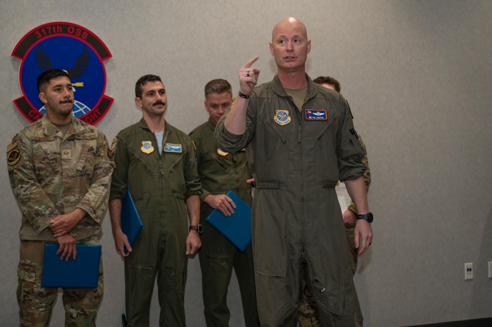 Airmen stand during the presentation of medals