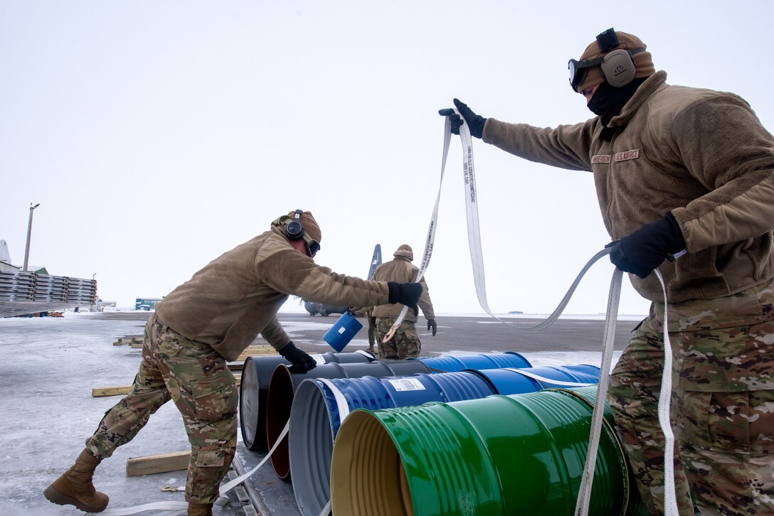 Airmen from the Kentucky Air National Guard’s 123rd Airlift Wing prepare unload cargo from a Kentucky C-130J Super Hercules aircraft in Deadhorse, Alaska, on April 25, 2024. Airmen from the squadron also palletized the cargo, which consists of construction materials to build homes for civilians as part of Innovative Readiness Training, a Defense Department program that provides service members with real-world deployment experience while offering lasting benefits to civilian populations. (U.S. Air National Guard photo by Phil Speck)