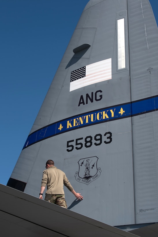 Tech. Sgt. Parker Nesbit, a crew chief with the Kentucky Air National Guard’s 123rd Aircraft Maintenance Squadron, inspects a Kentucky C-130J Super Hercules aircraft prior to departure from Joint Base Elmendorf-Richardson, Alaska, on April 26, 2024. The aircraft was being used to airlift construction materials to the Alaska’s North Slope, where they will be employed to build homes for civilians as part of Innovative Readiness Training, a Defense Department program that provides service members with real-world deployment experience while offering lasting benefits to civilian populations. (U.S. Air National Guard photo by Phil Speck)