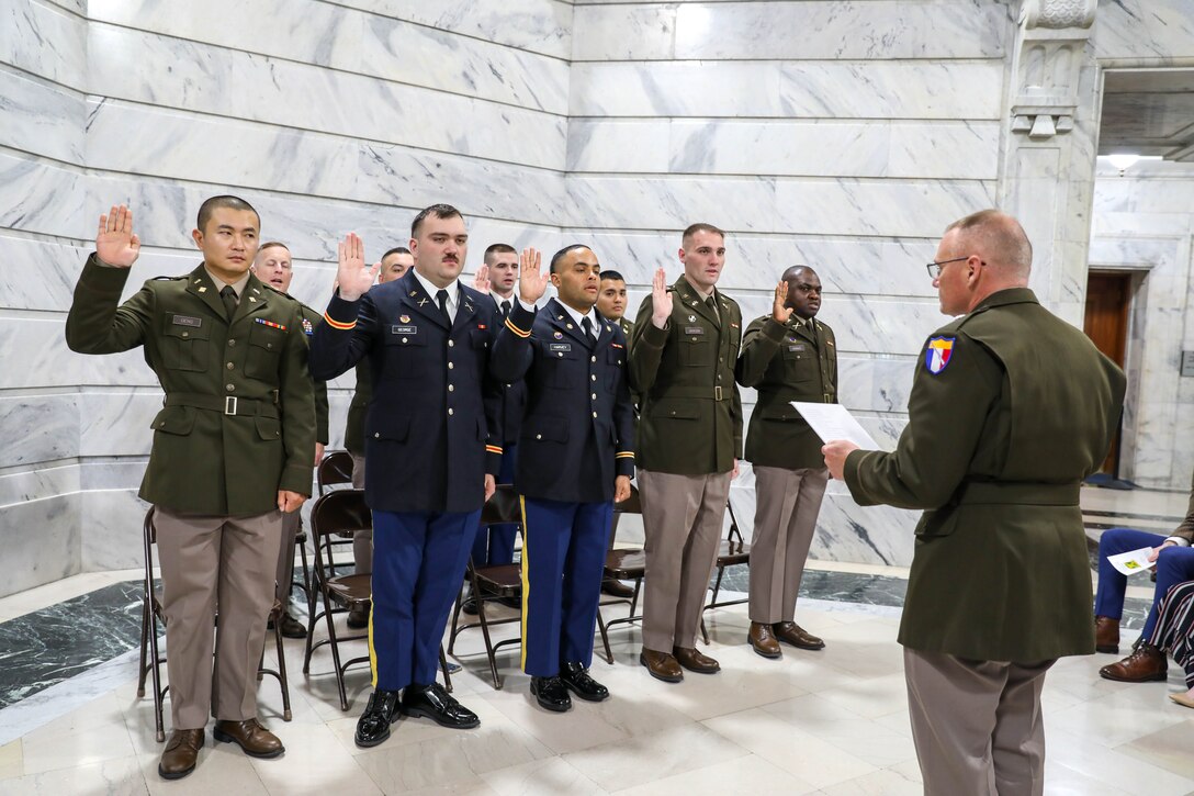 Family members, friends and fellow Guardsmen were in attendance for the officer commissioning ceremony inside the rotunda of the State Capitol building in Frankfort, Ky., April 20, 202. Nine officer candidates from Officer Candidate School Class 66-24 became the Kentucky National Guard’s newest second lieutenants. (U.S. Army National Guard photo by Sgt. Destini Keene)