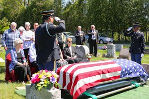 New York Army National Guard Sgt. Carlos Garcia, left, and Spc. Samantha Bruce, perform military funeral honors at the burial of Wilfred “Spike” Mailloux, a 100-year old New York National Guard veteran of the World War II Battle of Saipan, at St. Michael’s Cemetery in Waterford, New York, May 7, 2024. Mailloux survived the war’s largest Japanese banzai attack, which killed 502 Soldiers in the New York National Guard’s 105th Infantry Regiment on July 7, 1944.