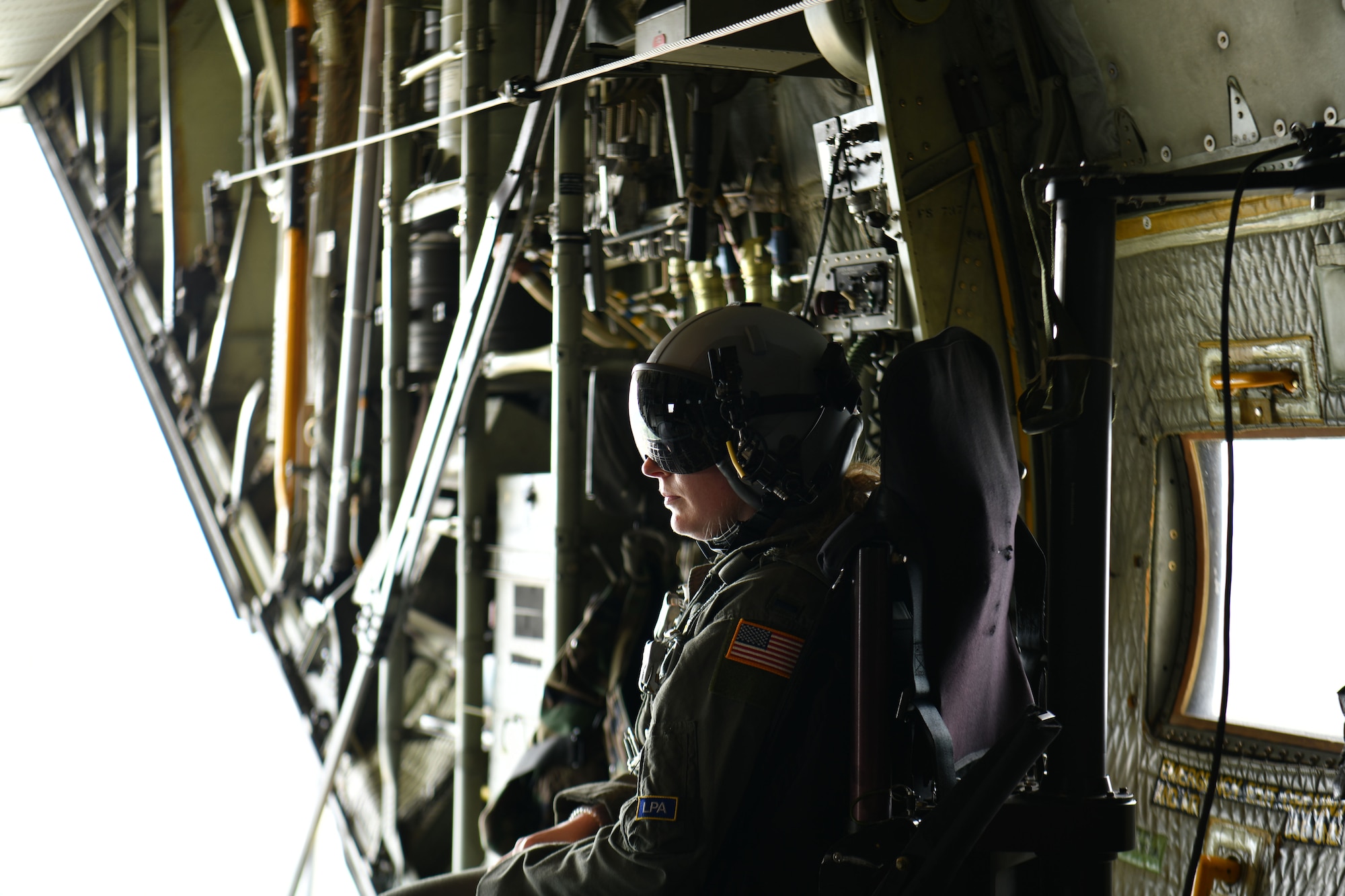 First Lt. Kala Grady, a navigator and tactics officer assigned to the 757th Airlift Squadron, sits aboard a local educator flight at Youngstown Air Reserve Station, Ohio, May 10, 2024.
