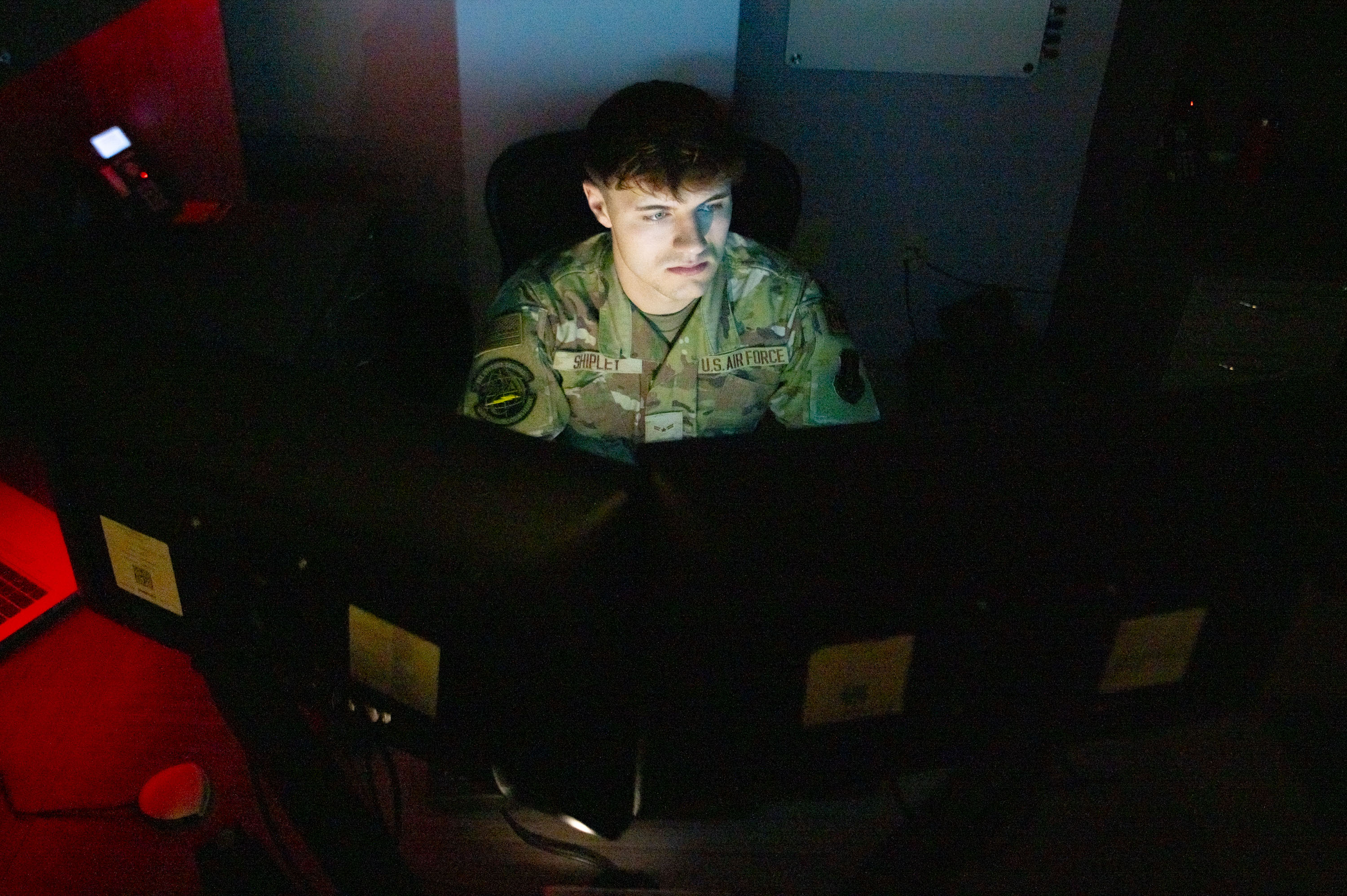 U.S. Air Force Airman Tyler Shipley, a cyber systems operations specialist with the 121st Air Refueling Wing, works on a computer at Rickenbacker Air National Guard Base, Columbus, Ohio, April 7, 2024. Shipley ensures effective and efficient communication and information flow throughout the base and installs, supports, and maintains servers and computer systems. (U.S. Air National Guard photo by Senior Airman Ivy Thomas)
