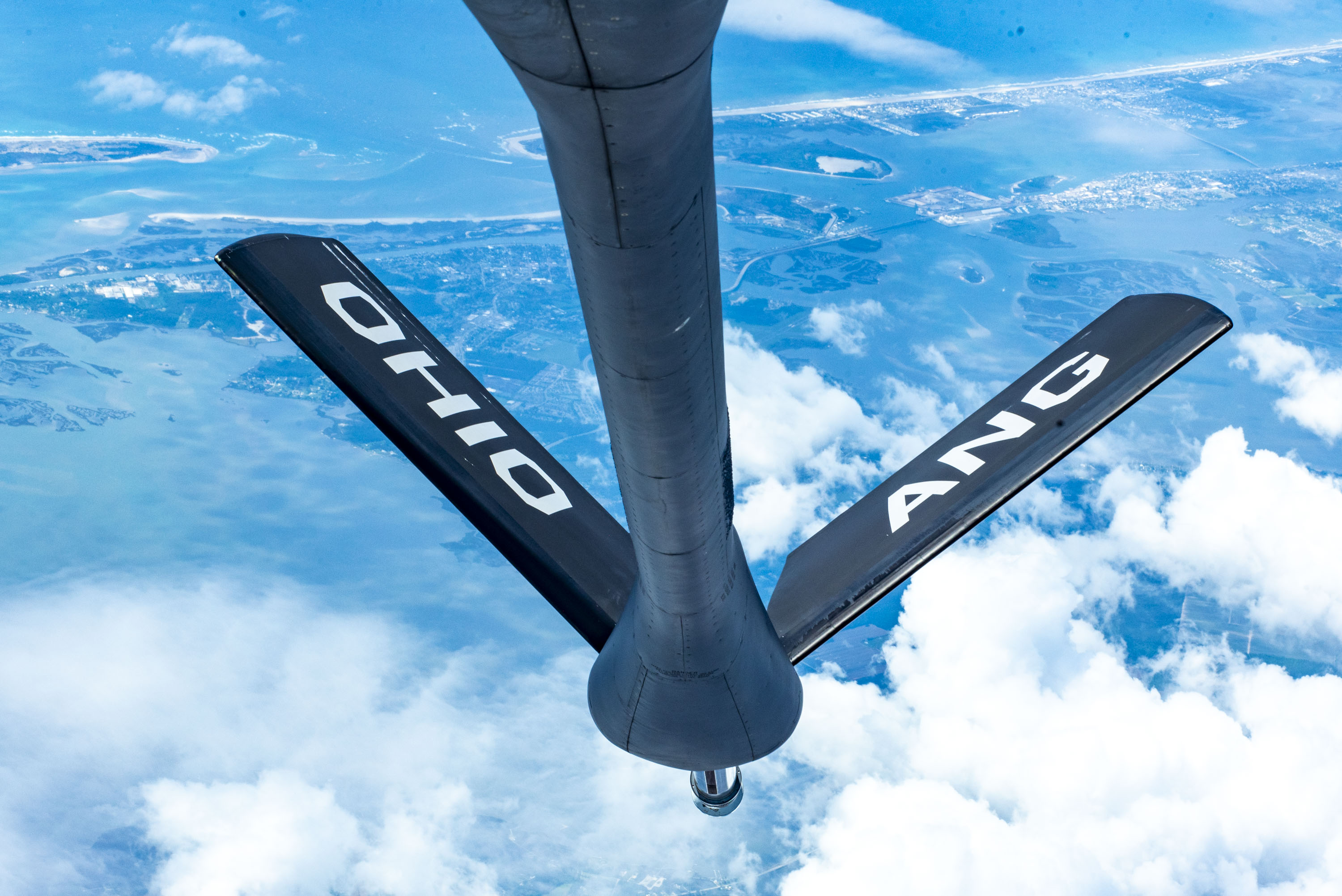 An F-15E Strike Eagle with the 4th Fighter Wing approaches a KC-135 Stratotanker from the 121st Air Refueling Wing to be refueled over the skies of North Carolina, May 7, 2024. The F-15E is a dual-role fighter designed to perform air-to-air and air-to-ground missions with an array of avionics and electronics systems that give it the capability to fight at low altitudes, day or night, and in all weather. (U.S. Air National Guard photo by Senior Airman Ivy Thomas)