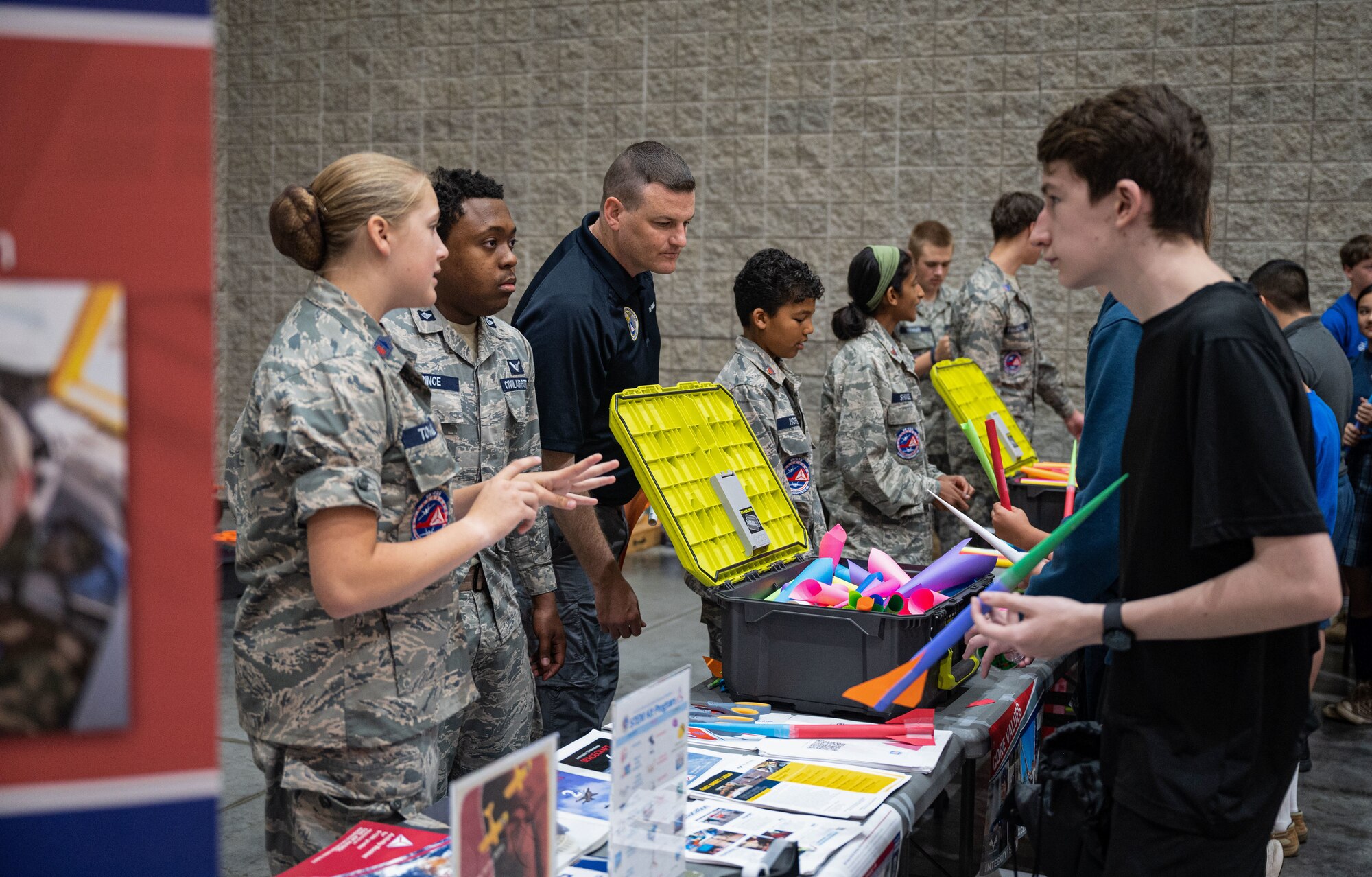 Civil Air Patrol cadets explain program specific items to local students.