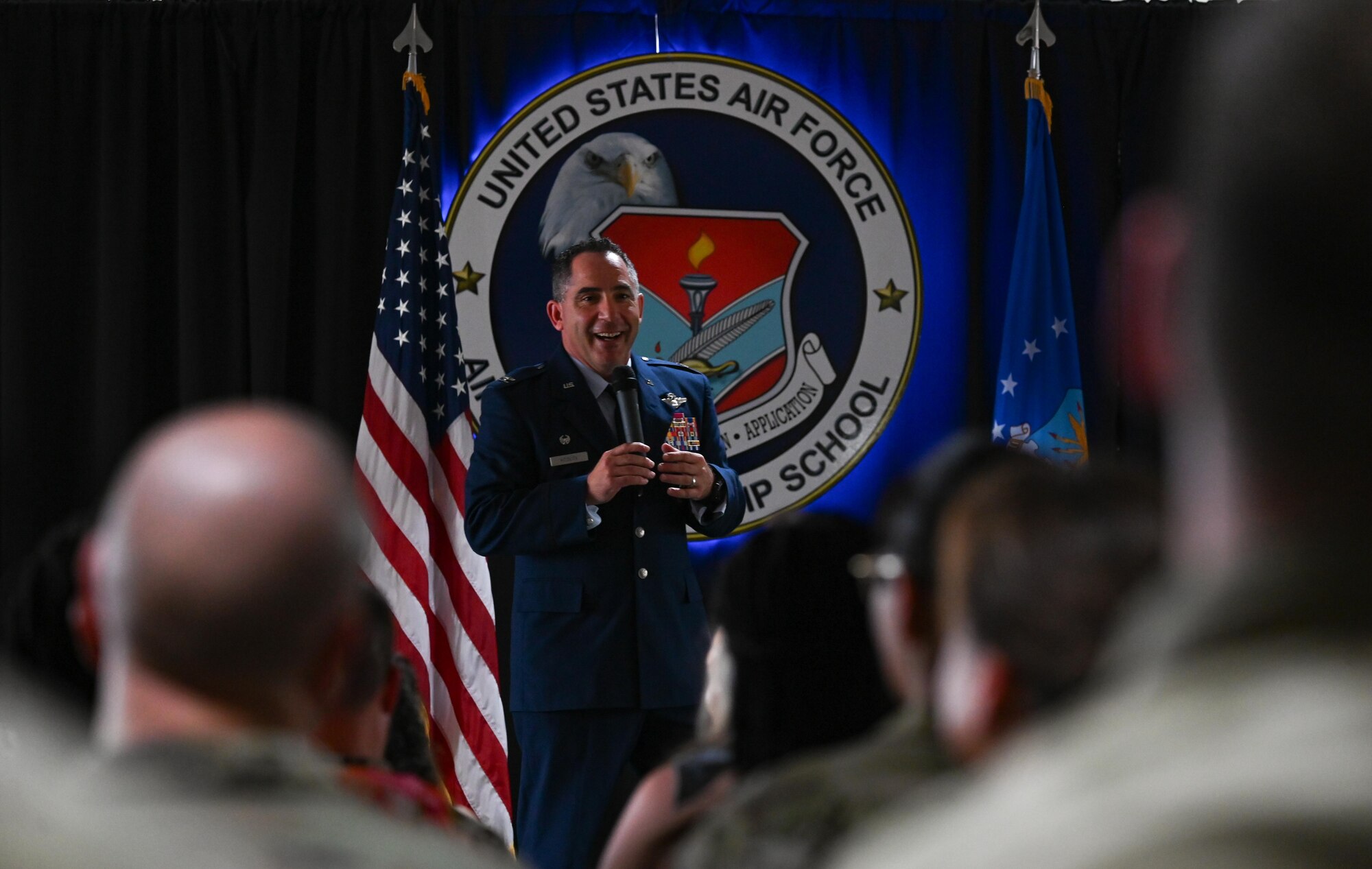 U.S. Air Force Col. Josh Koslov, 350th Spectrum Warfare Wing commander, gives closing remarks at the Eglin Airman Leadership School graduation at Eglin Air Force Base, Florida, May 9, 2024. The 350th SWW hosted Class 24-D and the wing’s senior leaders engaged with students throughout their coursers to further develop their leadership skills. (U.S. Air Force photo by Capt. Benjamin Aronson)