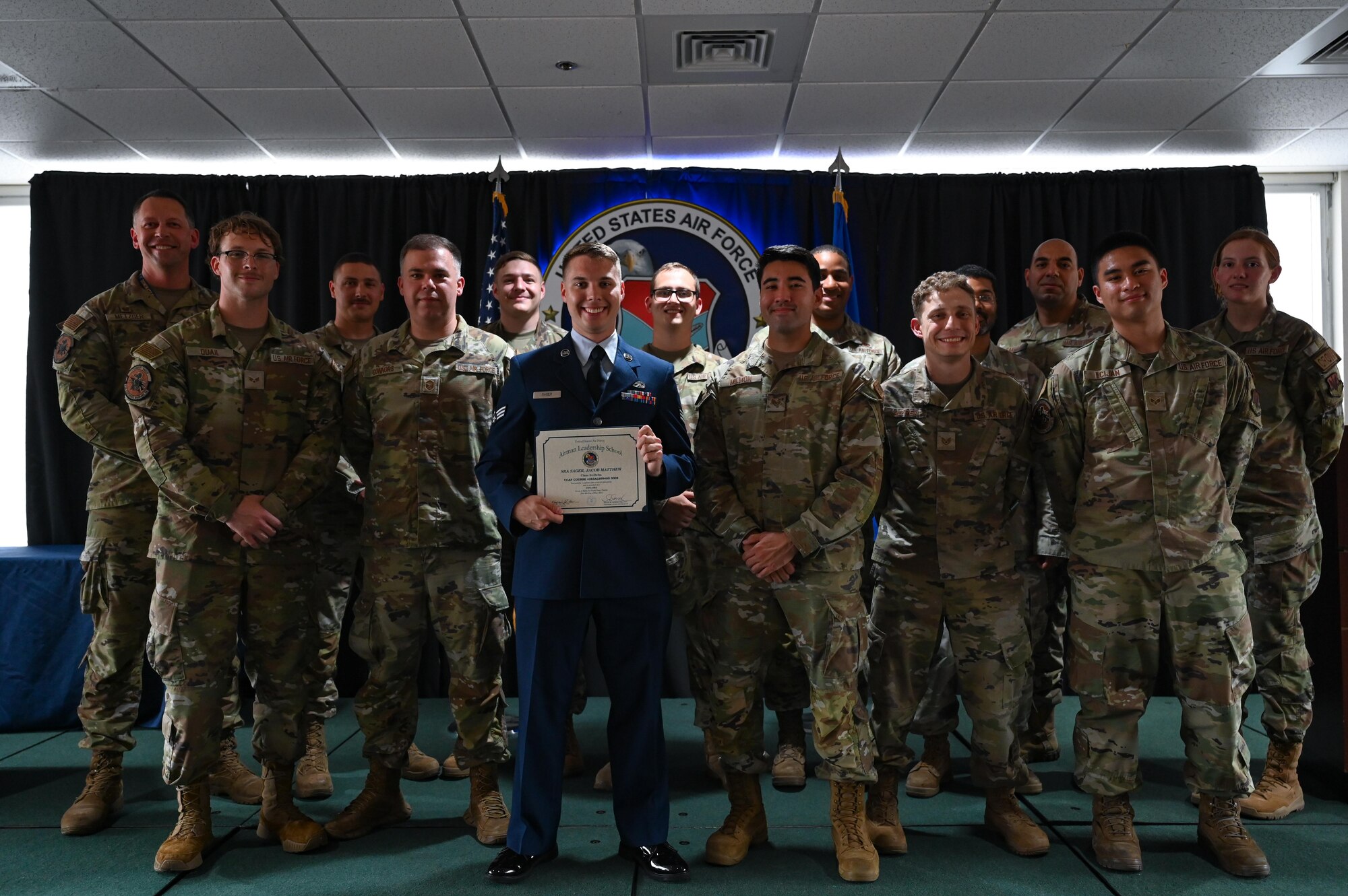 Airmen from the 87th Electronic Warfare Squadron pose for a photo with Senior Airman Jacob Sager, 87th EWS COMBAT SHIELD avionics electronic warfare journeyman, who graduated from Eglin Airman Leadership School at Eglin Air Force Base, Florida, May 9, 2024. Sager was one of four Airmen from the 350th Spectrum Warfare Wing to attend ALS and be part of Class 24-D. (U.S. Air Force photo by Capt. Benjamin Aronson)