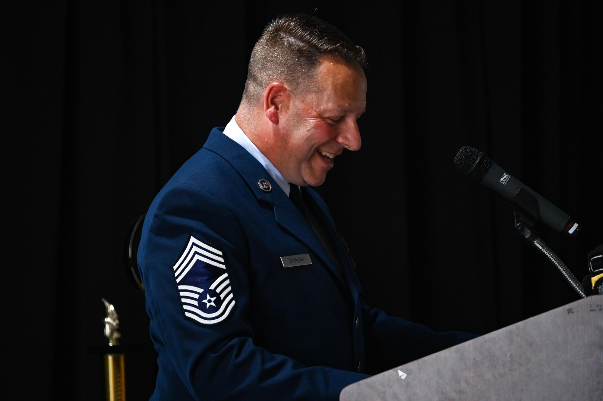 U.S. Air Force Chief Master Sgt. Michael Sterling, 850th Spectrum Warfare Group senior enlisted leader, gives a graduation speech during the graduation ceremony of the Eglin Airmen Leadership School Class 24-D at Eglin Air Force Base, Florida, May 9, 2024. Sterling served as the class mentor for Class 24-D, providing leadership guidance, mentorship and question and answers with the students during their classes. (U.S. Air Force photo by Capt. Benjamin Aronson)