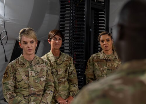 U.S. Air Force Maj. Gen. Michele Edmondson, Second Air Force commander, talks with U.S. Army Sgt. 1st Class Ricardo Davis, 344th Military Intelligence Battalion instructor, during a brief at JADE FORGE, Goodfellow Air Force Base, Texas, May 7, 2024. Second Air Force developed a deliberate plan defining eight key training imperatives to achieve its vision of a sixth-generation learning environment. (U.S. Air Force photo by Senior Airman Sarah Williams)